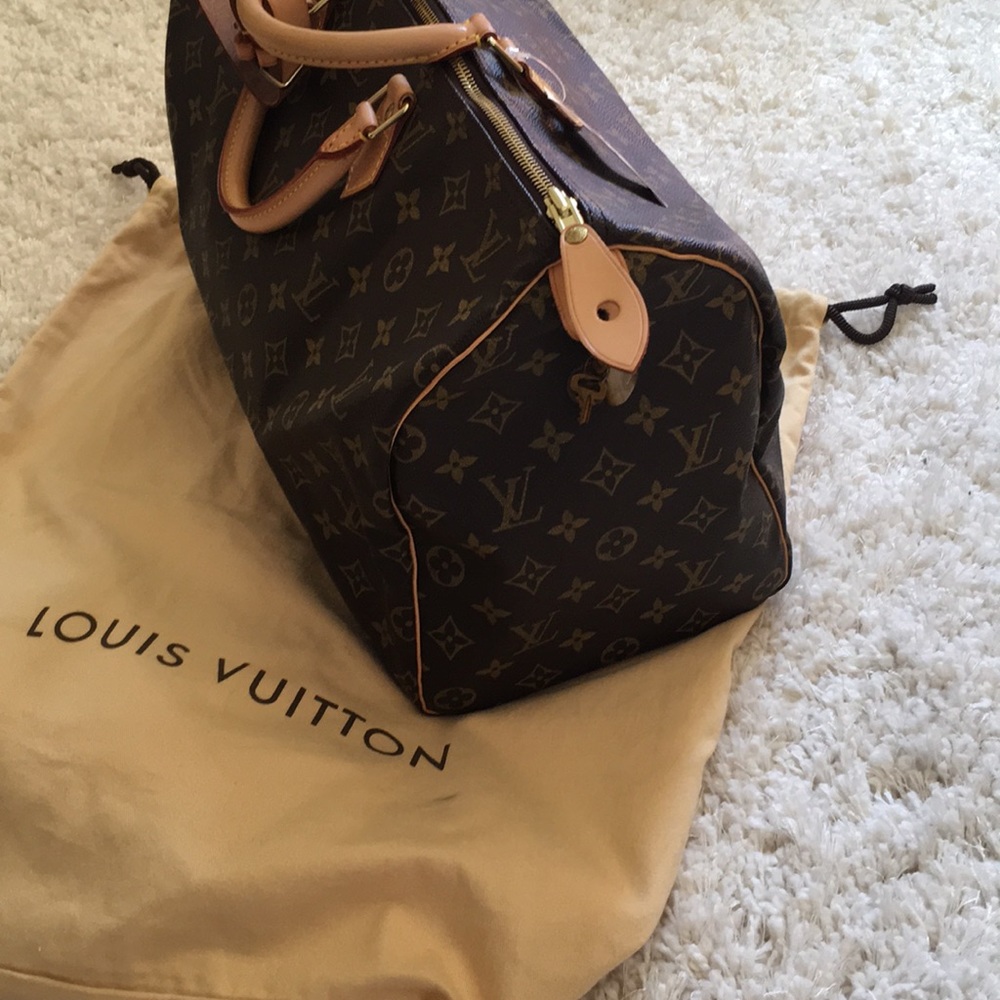{Louis Vuitton} luggage bag - Picture 2 of 5